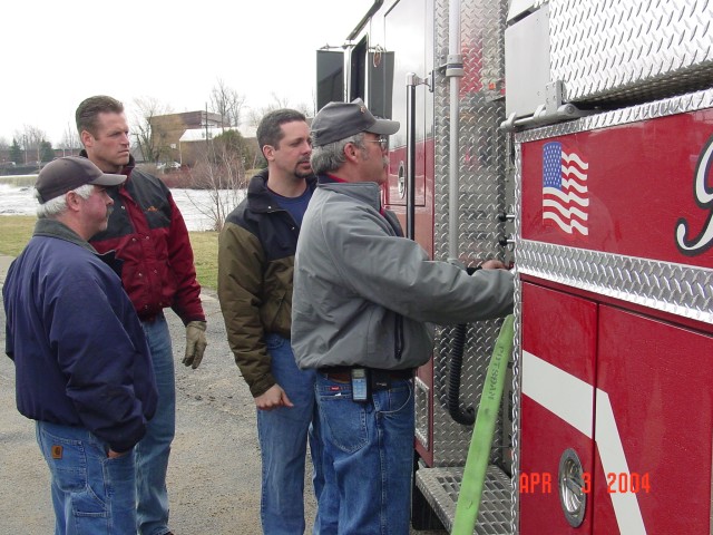 April 2004 - KME representatives train Past Chief Bob Robar and Past Chief John Keleher on the new TA-100